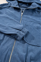 Teal Hooded Jacket Featuring Zipper and Adjustable Drawstring