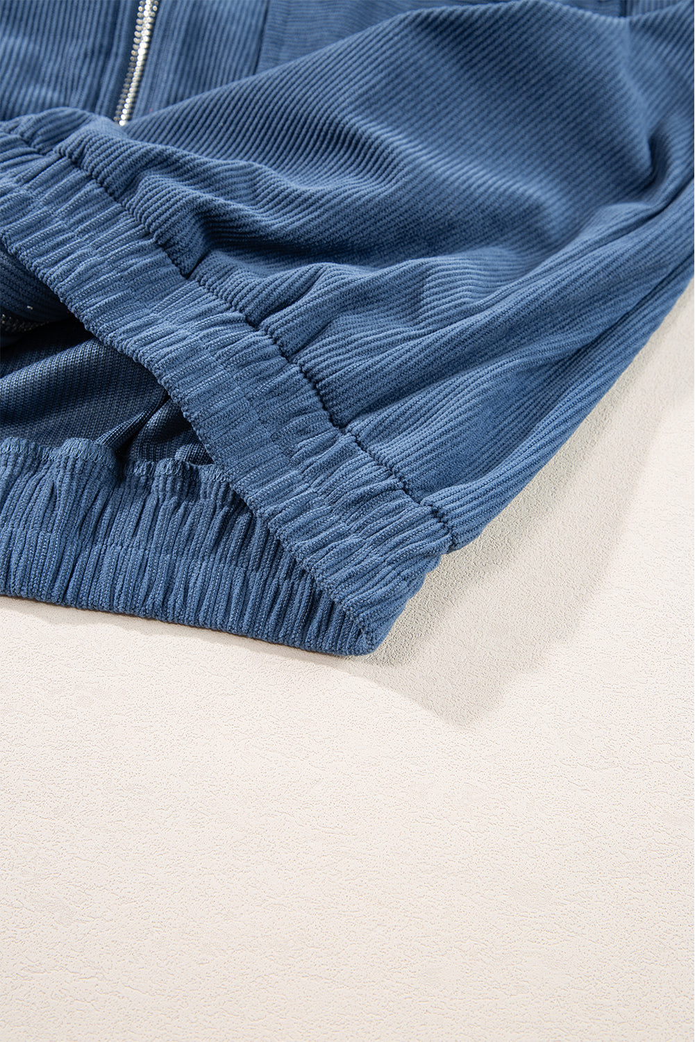 Teal Hooded Jacket Featuring Zipper and Adjustable Drawstring